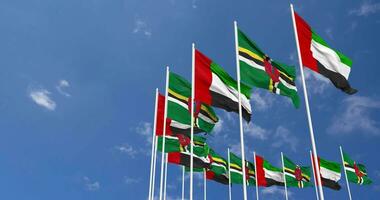 Dominica and United Arab Emirates, UAE Flags Waving Together in the Sky, Seamless Loop in Wind, Space on Left Side for Design or Information, 3D Rendering video