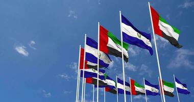 El Salvador and United Arab Emirates, UAE Flags Waving Together in the Sky, Seamless Loop in Wind, Space on Left Side for Design or Information, 3D Rendering video
