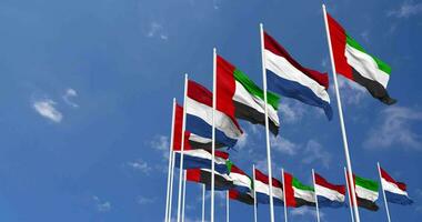 Netherlands and United Arab Emirates, UAE Flags Waving Together in the Sky, Seamless Loop in Wind, Space on Left Side for Design or Information, 3D Rendering video