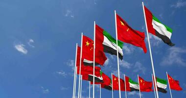 China and United Arab Emirates, UAE Flags Waving Together in the Sky, Seamless Loop in Wind, Space on Left Side for Design or Information, 3D Rendering video