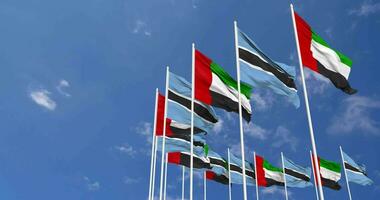 Botswana and United Arab Emirates, UAE Flags Waving Together in the Sky, Seamless Loop in Wind, Space on Left Side for Design or Information, 3D Rendering video