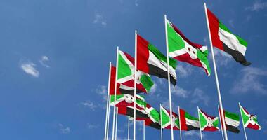 Burundi and United Arab Emirates, UAE Flags Waving Together in the Sky, Seamless Loop in Wind, Space on Left Side for Design or Information, 3D Rendering video