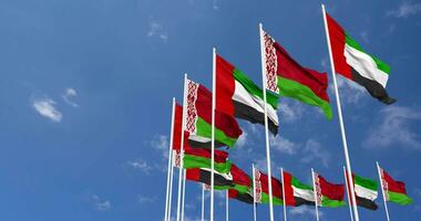 Belarus and United Arab Emirates, UAE Flags Waving Together in the Sky, Seamless Loop in Wind, Space on Left Side for Design or Information, 3D Rendering video