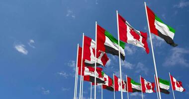 Canada and United Arab Emirates, UAE Flags Waving Together in the Sky, Seamless Loop in Wind, Space on Left Side for Design or Information, 3D Rendering video