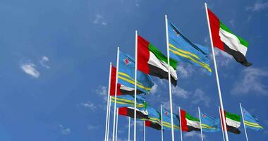 Aruba and United Arab Emirates, UAE Flags Waving Together in the Sky, Seamless Loop in Wind, Space on Left Side for Design or Information, 3D Rendering video