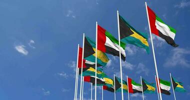 Bahamas and United Arab Emirates, UAE Flags Waving Together in the Sky, Seamless Loop in Wind, Space on Left Side for Design or Information, 3D Rendering video