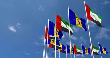 barbados y unido árabe emiratos, uae banderas ondulación juntos en el cielo, sin costura lazo en viento, espacio en izquierda lado para diseño o información, 3d representación video