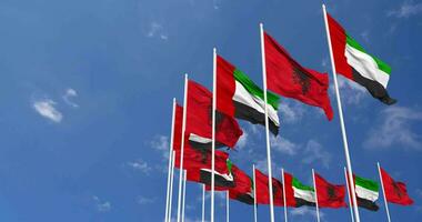 Albania and United Arab Emirates, UAE Flags Waving Together in the Sky, Seamless Loop in Wind, Space on Left Side for Design or Information, 3D Rendering video