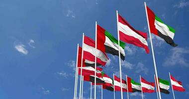 Austria and United Arab Emirates, UAE Flags Waving Together in the Sky, Seamless Loop in Wind, Space on Left Side for Design or Information, 3D Rendering video