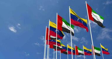 Bolivarian Republic of Venezuela and United Arab Emirates, UAE Flags Waving Together in the Sky, Seamless Loop in Wind, Space on Left Side for Design or Information, 3D Rendering video