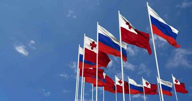 Tonga and Russia Flags Waving Together in the Sky, Seamless Loop in Wind, Space on Left Side for Design or Information, 3D Rendering video