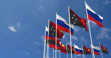 Papua New Guinea and Russia Flags Waving Together in the Sky, Seamless Loop in Wind, Space on Left Side for Design or Information, 3D Rendering video