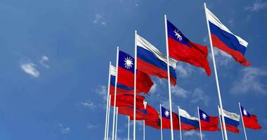 Taiwan e Rússia bandeiras acenando juntos dentro a céu, desatado ciclo dentro vento, espaço em esquerda lado para Projeto ou Informação, 3d Renderização video
