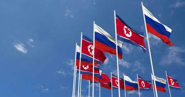 North Korea and Russia Flags Waving Together in the Sky, Seamless Loop in Wind, Space on Left Side for Design or Information, 3D Rendering video