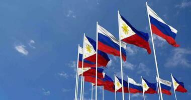 Philippines and Russia Flags Waving Together in the Sky, Seamless Loop in Wind, Space on Left Side for Design or Information, 3D Rendering video