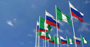 Nigeria and Russia Flags Waving Together in the Sky, Seamless Loop in Wind, Space on Left Side for Design or Information, 3D Rendering video