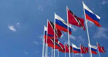 Trinidad and Tobago and Russia Flags Waving Together in the Sky, Seamless Loop in Wind, Space on Left Side for Design or Information, 3D Rendering video