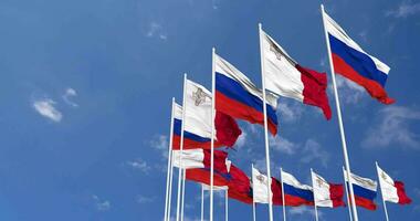 Malta and Russia Flags Waving Together in the Sky, Seamless Loop in Wind, Space on Left Side for Design or Information, 3D Rendering video