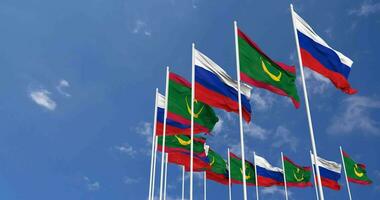 Mauritania and Russia Flags Waving Together in the Sky, Seamless Loop in Wind, Space on Left Side for Design or Information, 3D Rendering video