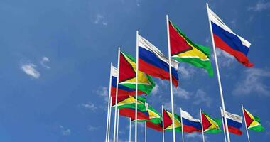 Guyana and France Flags Waving Together in the Sky, Seamless Loop in Wind, Space on Left Side for Design or Information, 3D Rendering video