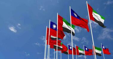 Taiwán y unido árabe emiratos, uae banderas ondulación juntos en el cielo, sin costura lazo en viento, espacio en izquierda lado para diseño o información, 3d representación video