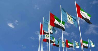 Guatemala and United Arab Emirates, UAE Flags Waving Together in the Sky, Seamless Loop in Wind, Space on Left Side for Design or Information, 3D Rendering video