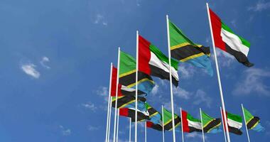 Tanzania and United Arab Emirates, UAE Flags Waving Together in the Sky, Seamless Loop in Wind, Space on Left Side for Design or Information, 3D Rendering video