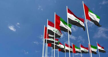 Iraq and United Arab Emirates, UAE Flags Waving Together in the Sky, Seamless Loop in Wind, Space on Left Side for Design or Information, 3D Rendering video