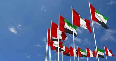 Peru and United Arab Emirates, UAE Flags Waving Together in the Sky, Seamless Loop in Wind, Space on Left Side for Design or Information, 3D Rendering video