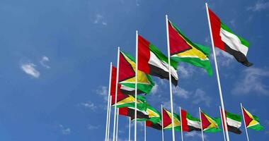 Guyana and United Arab Emirates, UAE Flags Waving Together in the Sky, Seamless Loop in Wind, Space on Left Side for Design or Information, 3D Rendering video