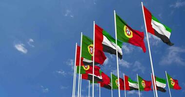 Portugal and United Arab Emirates, UAE Flags Waving Together in the Sky, Seamless Loop in Wind, Space on Left Side for Design or Information, 3D Rendering video