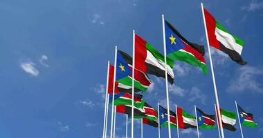 South Sudan and United Arab Emirates, UAE Flags Waving Together in the Sky, Seamless Loop in Wind, Space on Left Side for Design or Information, 3D Rendering video