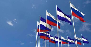 El Salvador and France Flags Waving Together in the Sky, Seamless Loop in Wind, Space on Left Side for Design or Information, 3D Rendering video