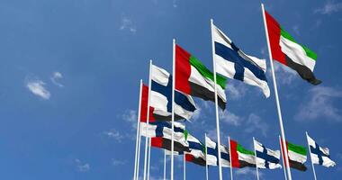 Finland and United Arab Emirates, UAE Flags Waving Together in the Sky, Seamless Loop in Wind, Space on Left Side for Design or Information, 3D Rendering video