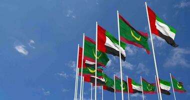 Mauritania and United Arab Emirates, UAE Flags Waving Together in the Sky, Seamless Loop in Wind, Space on Left Side for Design or Information, 3D Rendering video