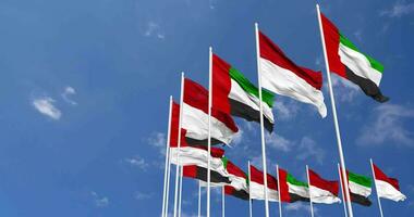 Monaco and United Arab Emirates, UAE Flags Waving Together in the Sky, Seamless Loop in Wind, Space on Left Side for Design or Information, 3D Rendering video