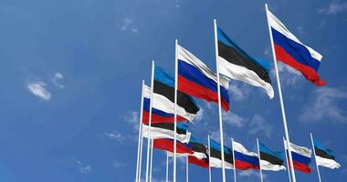 Estonia and France Flags Waving Together in the Sky, Seamless Loop in Wind, Space on Left Side for Design or Information, 3D Rendering video