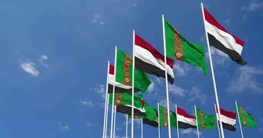 Turkmenistan and Yemen Flags Waving Together in the Sky, Seamless Loop in Wind, Space on Left Side for Design or Information, 3D Rendering video