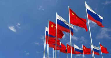 China and France Flags Waving Together in the Sky, Seamless Loop in Wind, Space on Left Side for Design or Information, 3D Rendering video