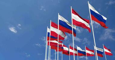 Austria and France Flags Waving Together in the Sky, Seamless Loop in Wind, Space on Left Side for Design or Information, 3D Rendering video