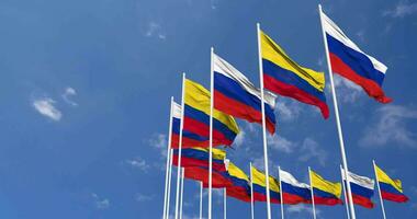 Colombia and France Flags Waving Together in the Sky, Seamless Loop in Wind, Space on Left Side for Design or Information, 3D Rendering video