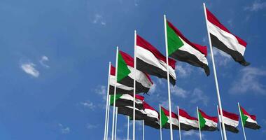 Sudan and Yemen Flags Waving Together in the Sky, Seamless Loop in Wind, Space on Left Side for Design or Information, 3D Rendering video