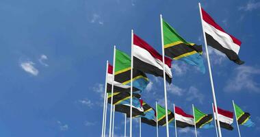 Tanzania and Yemen Flags Waving Together in the Sky, Seamless Loop in Wind, Space on Left Side for Design or Information, 3D Rendering video