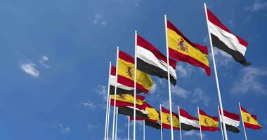 Spain and Yemen Flags Waving Together in the Sky, Seamless Loop in Wind, Space on Left Side for Design or Information, 3D Rendering video