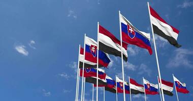 Slovakia and Yemen Flags Waving Together in the Sky, Seamless Loop in Wind, Space on Left Side for Design or Information, 3D Rendering video