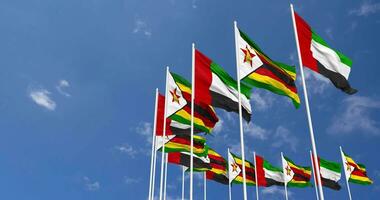 Zimbabwe and United Arab Emirates, UAE Flags Waving Together in the Sky, Seamless Loop in Wind, Space on Left Side for Design or Information, 3D Rendering video
