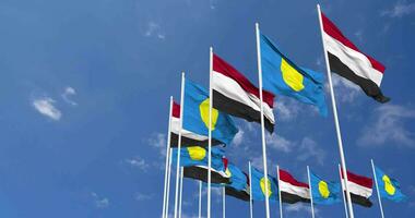 Palau and Yemen Flags Waving Together in the Sky, Seamless Loop in Wind, Space on Left Side for Design or Information, 3D Rendering video