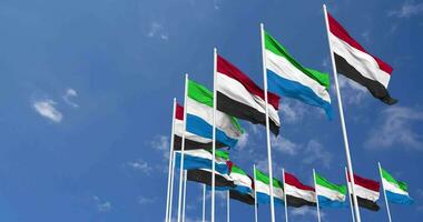 Sierra Leone and Yemen Flags Waving Together in the Sky, Seamless Loop in Wind, Space on Left Side for Design or Information, 3D Rendering video