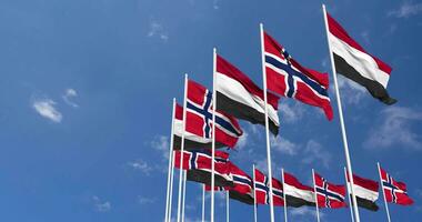 Norway and Yemen Flags Waving Together in the Sky, Seamless Loop in Wind, Space on Left Side for Design or Information, 3D Rendering video