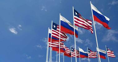 Liberia and France Flags Waving Together in the Sky, Seamless Loop in Wind, Space on Left Side for Design or Information, 3D Rendering video